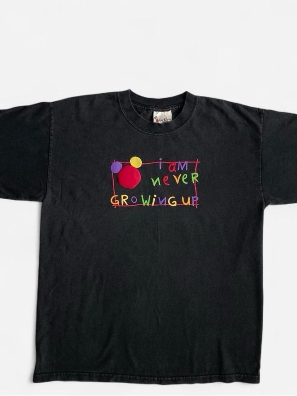 Vintage faded black Disney I am never growing up tee